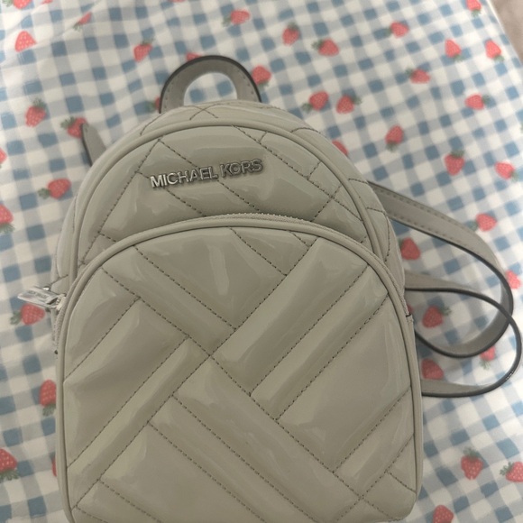 Michael Kors Silver Quilted Backpack - Picture 1 of 1